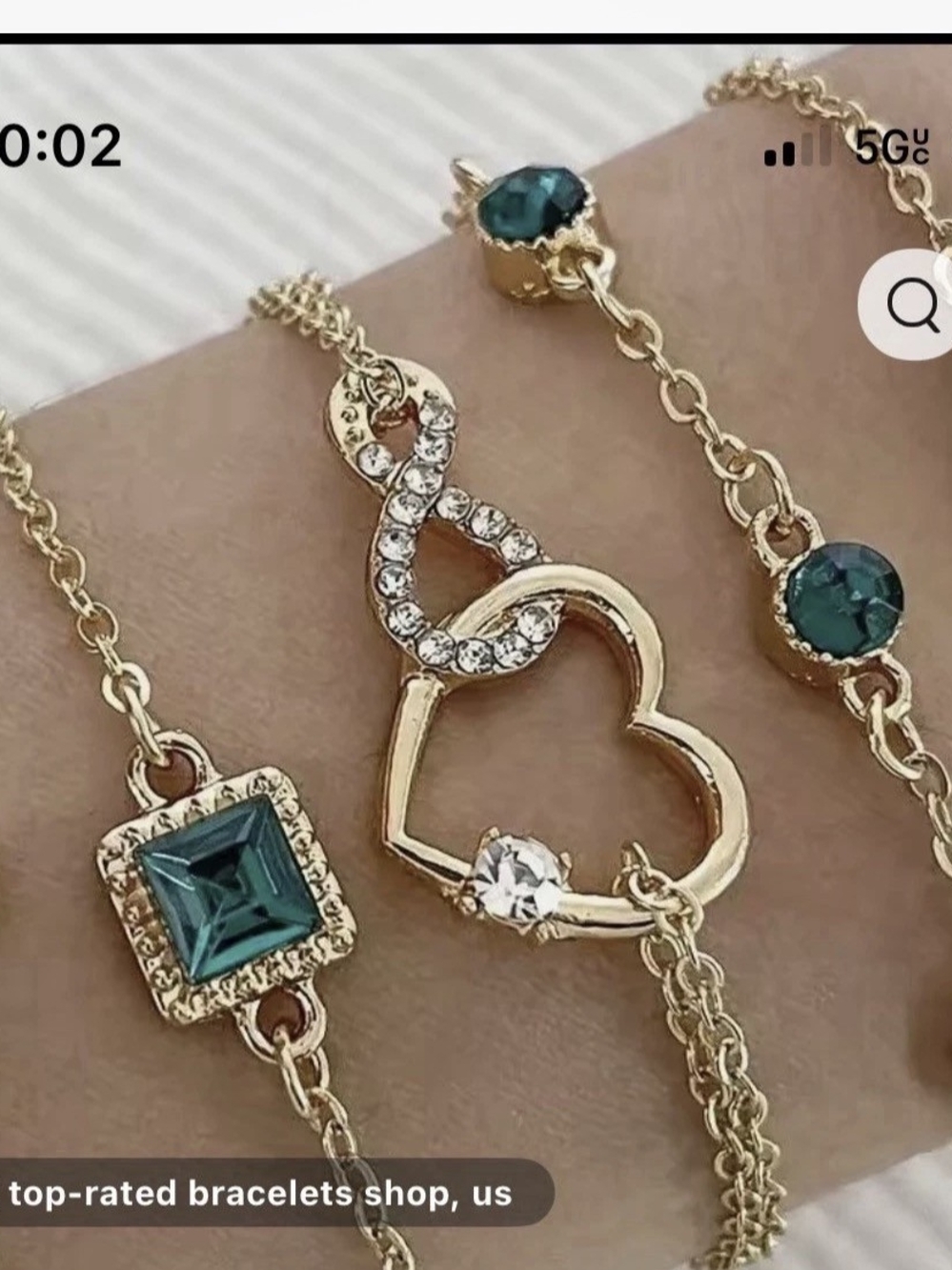 Gold Bracelet Set with Emerald-Green Stones and Heart Charm